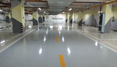 秀珀浮動彩砂自流平地坪，傾力裝扮武漢光谷生物醫(yī)藥創(chuàng)新中心地下車庫